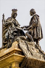 Monument with Columbus and Queen Isabella I of Castile in the Plaza de Isabel la Catolica in Granada