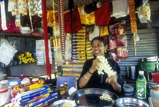 A girl selling Pooja things in Karumadi near Ambalapuzha
