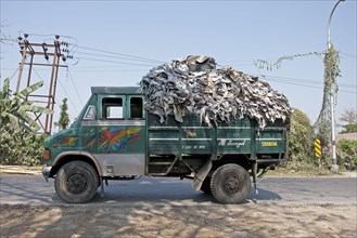 Recycled leather being delivered by lorry to make potash