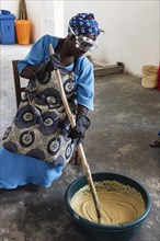 Woman making soap