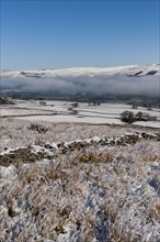 Upper Wensleydale near Hawes is snow-capped and overlooks Abbotside. North Yorkshire