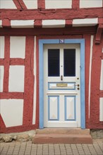 Front door on half-timbered house in main street in Hofheim