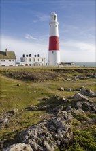 View of red and white painted lighthouse