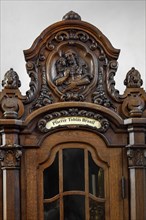 Richly carved confessional