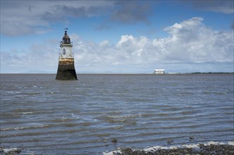 View over estuary with lighthouse
