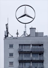 Mercedes star on a high-rise building