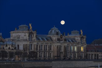 Full moon over the Academy of Arts at blue hour