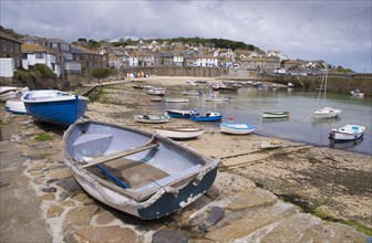View of boats and fishing village on the coast