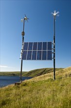 Combination of solar panels and wind turbines