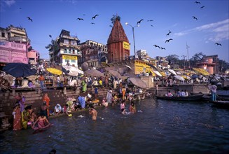Pilgrims bathing in the Dashashwamedh Ghat of Ganges