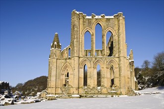View of the ruins of a Cistercian abbey in the snow
