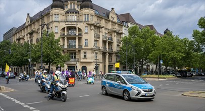 Berlin police escorting a bicycle parade on Kurfuerstendamm
