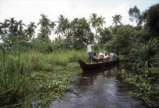 Tourists enjoying boat journey a delightful experience. Backwaters of Kodungallur