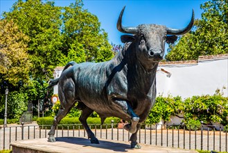 Bronze bull in front of the bullring