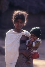 Jenu Kurumba lady with her babe in Bandipur