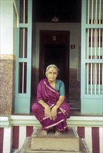 A bramin old lady sitting in front of her Agraharam house at Sundarapandiapuram near Courtallam