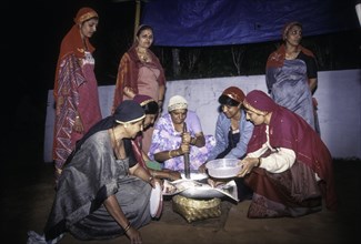 Kodava women making rice ball