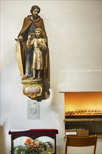 Figure of St. Joseph with sacrificial candles