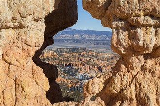 View of Bryce Canyon through an arched rock