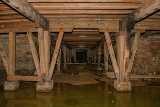 Substructure arena cellar of historic Roman amphitheatre of Trier Treverorum Augusta with supports stamp of wood in groundwater