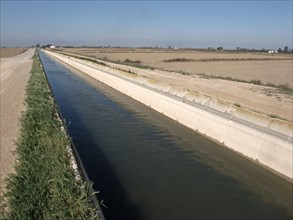 Irrigation canal carrying water to fields