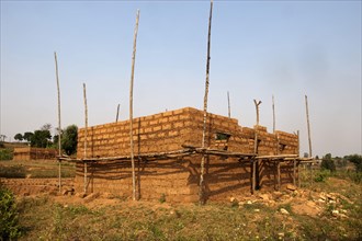 House being built from mud bricks