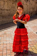 Girls in flamenco costumes at the folk festival