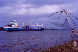 Chinese fishing net and a ship in Fort Kochi
