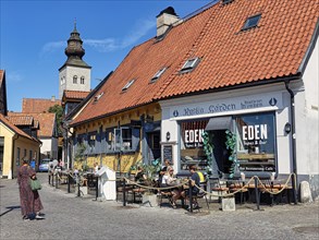 Restaurants with tourists in the pedestrian zone