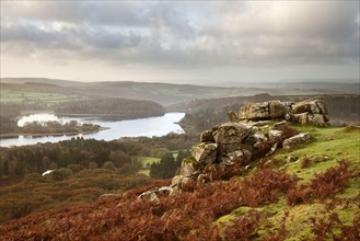 View across the moorland to the reservoir at sunrise