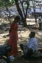 Romantic talk at Thudiyalur market near Coimbatore