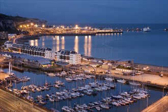 View of marina and coastal harbour at night