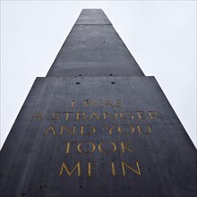 Artwork Obelisk with a quote from the Gospel of Matthew