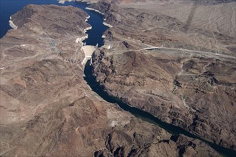 Aerial view of the arch gravity dam on the river