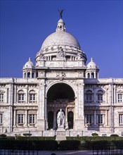 The Victoria Memorial is a large marble building in Kolkata