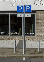 Traffic sign for a disabled parking space