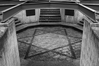 Memorial on the square of the Old Synagogue with the Star of David