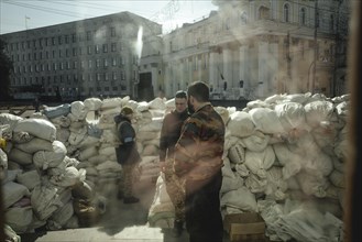 Sandbags and barricades in front of the city administration