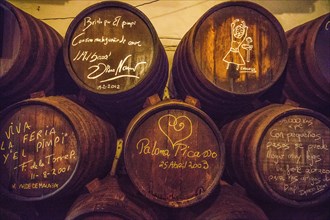 Sherry barrels signed by Paloma Picasso in a traditional tapas bar