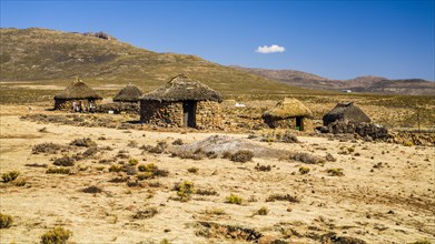 Huts on the high plateau at the Sani Pass