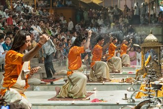 Priests celebrate a Hindu ceremony on the banks of the Ganges