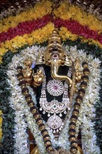 Decorated golden Ganesha in Karpaga Vinayagar temple in Pillaiyarpatti