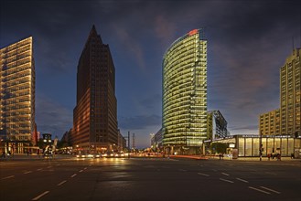 Building of the Daimler Benz area on the left and Bahntower and Beisheim-Center on the right in the evening at Potsdamer Platz