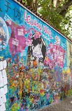 Colourful graffiti on John Lennon Wall
