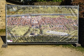 Display panel in historical Roman amphitheatre with overview of Roman city Trier Treverorum Augusta in time of antiquity
