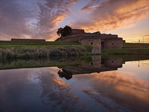 Heldrungen moated castle and fortress at sunset