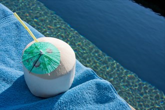 A Coconut Drink by the Pool