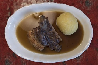 Schaeufele with dumpling served in a Franconian inn