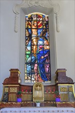 Side altar with colourful window