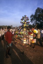 A Boy Selling balloons in Anthimahakalan Kavu festival at Kulappully